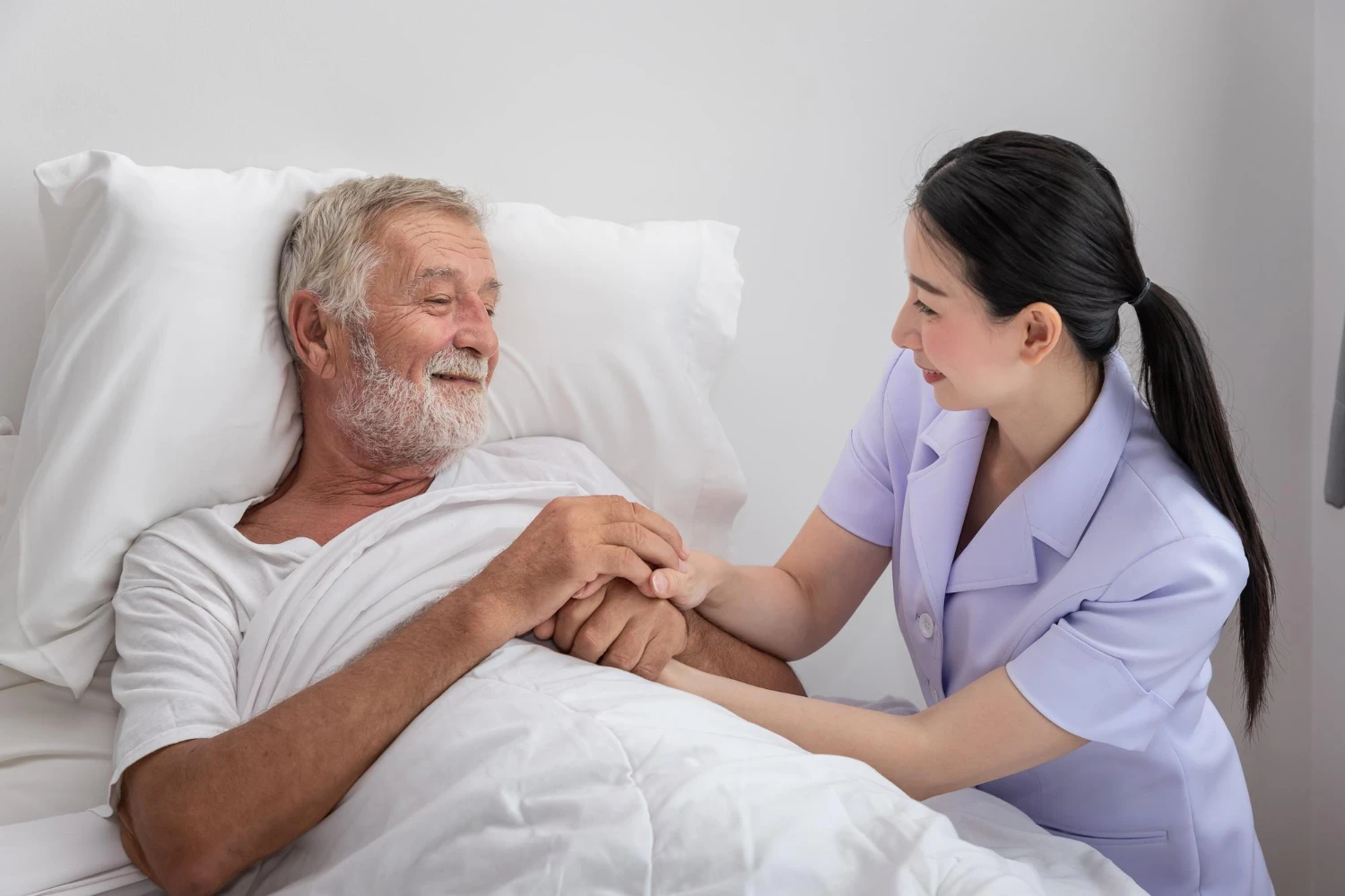 Caregiver Assisting Patient at Home